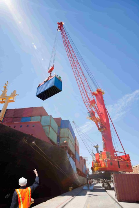 cargo-ship-being-loaded-with-shipping-containers-2026-03-26-08-14-32-utc (1)