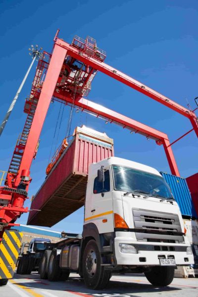 close-up-of-cargo-container-loaded-on-a-lorry-at-a-2026-01-11-09-44-30-utc (1)